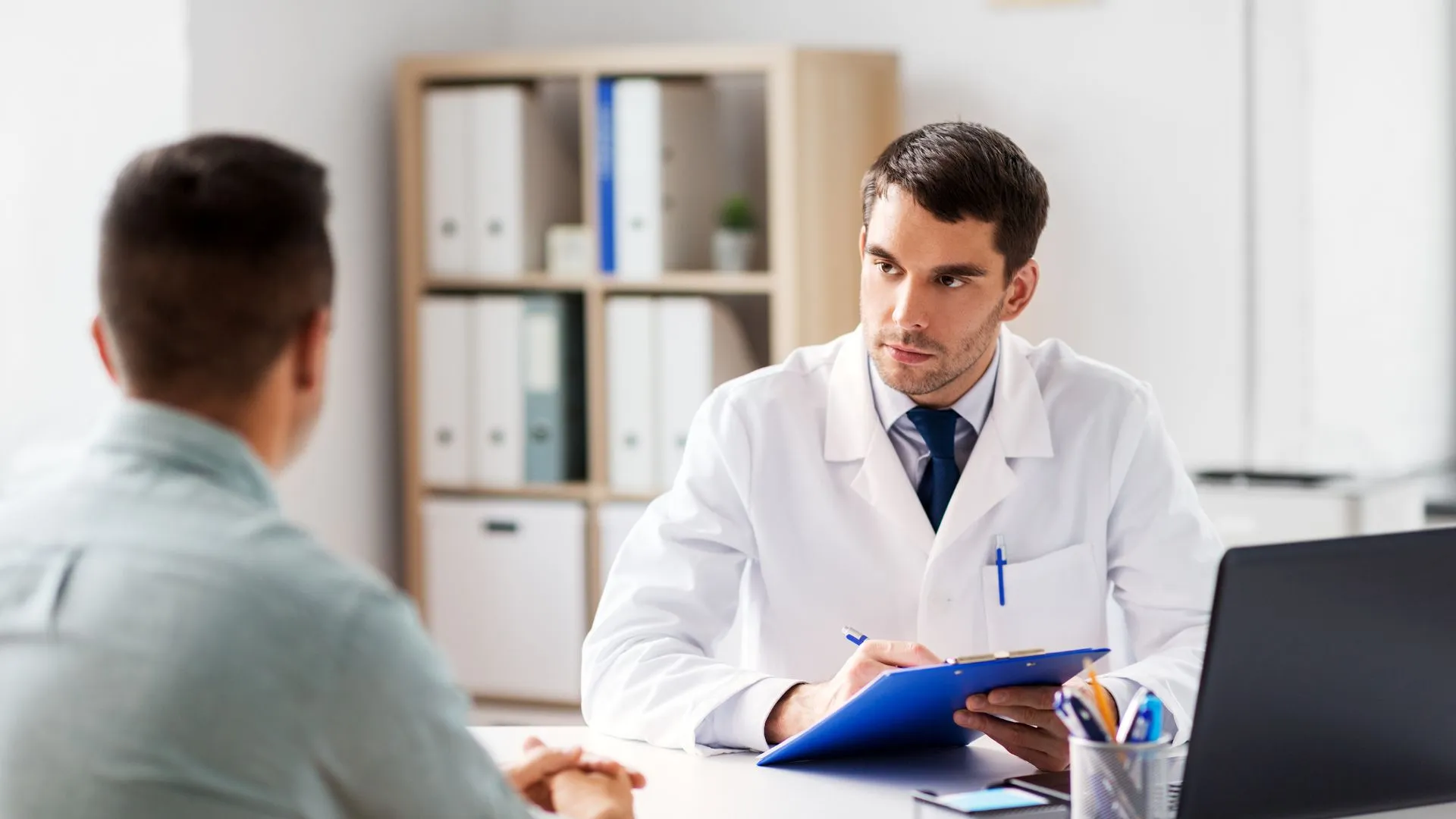 A doctor talking with a patient
