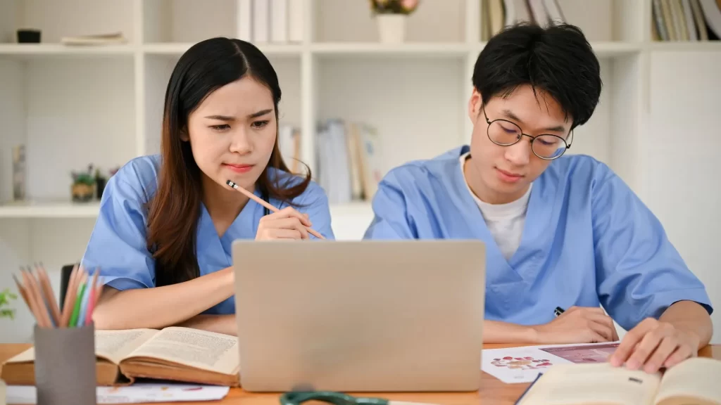 Two doctors looking confused while wondering if medical practices should focus more on local or general SEO