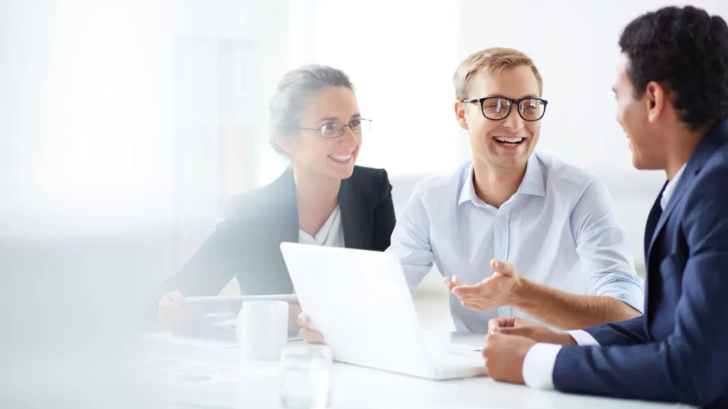 Financial advisors meeting with an SEO professional