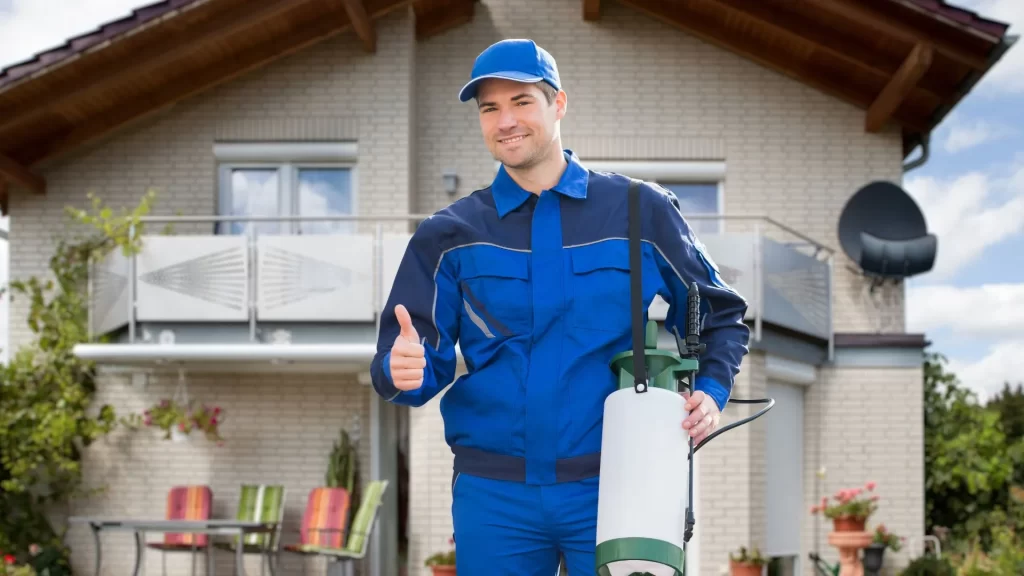 A pest control company representative posing for the camera