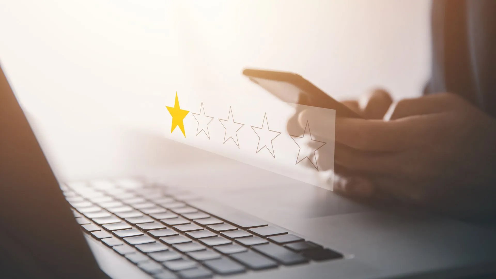 An open laptop and 1 star review symbolizing a bad review from Google My Business